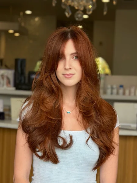 Long Copper Hair with Curtain Bangs