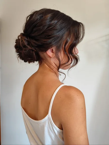 Wavy Low Chignon with Bangs