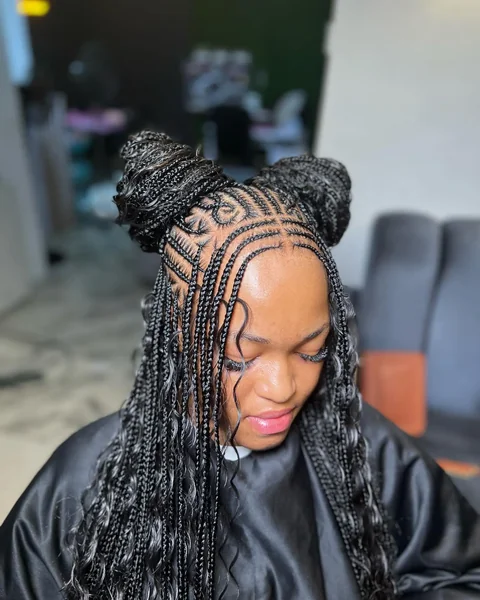 Two Space Buns With Boho Braids