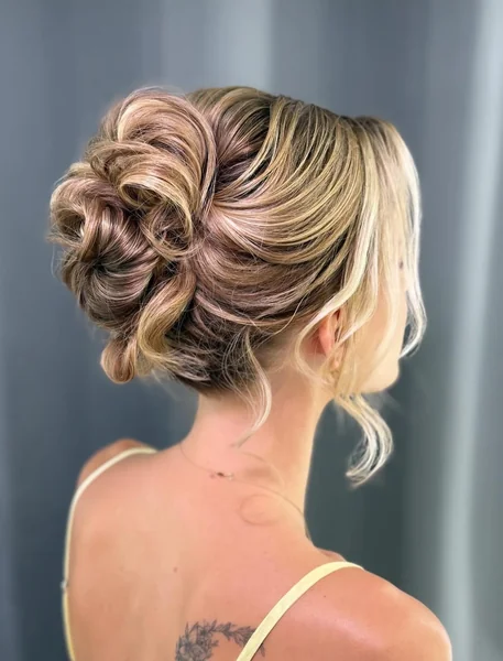 Curled High Bun Updo