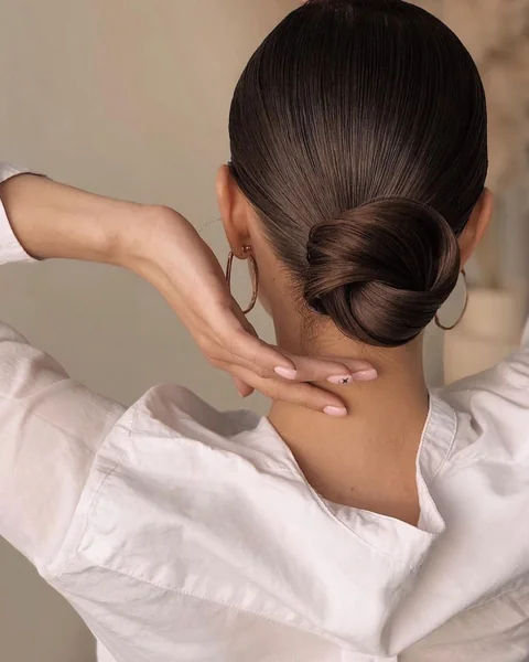 Slickback Low Wavy Ponytail