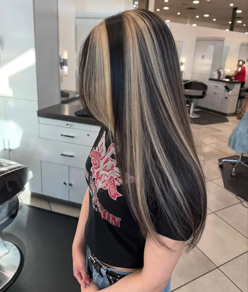 Sleek Black Hair with Blonde Stripes