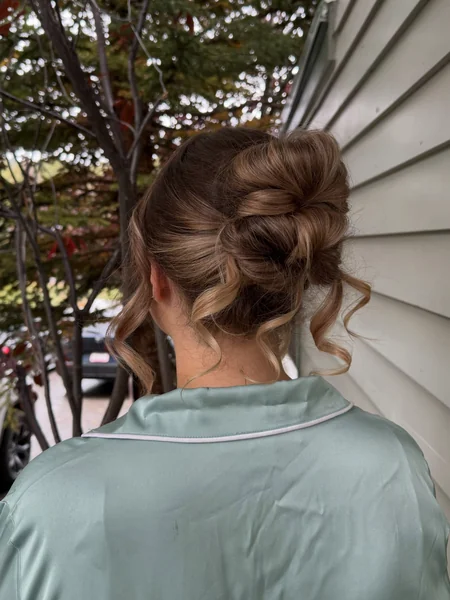 Romantic Twisted Bun with Curled Tendrils