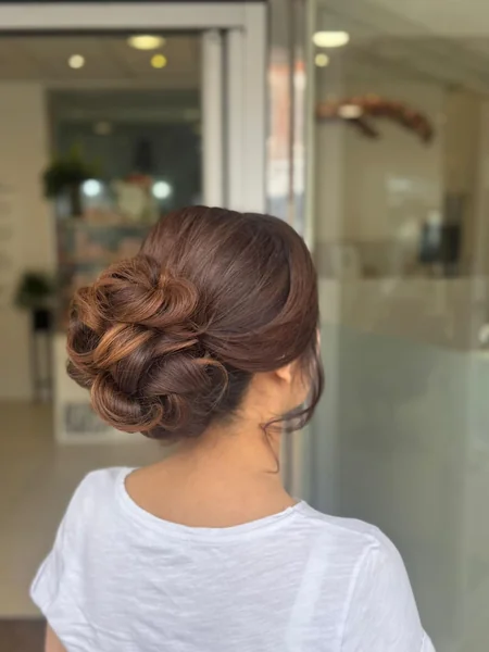 Rolled Curl Low Bun
