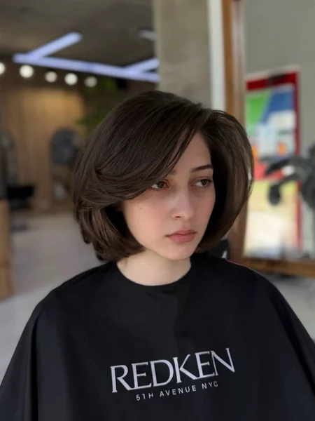 Voluminous Brunette Bob with Side Sweep