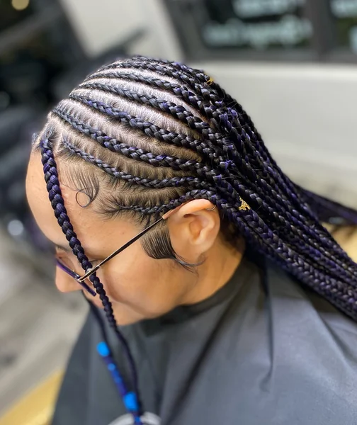 Lemonade Braids with Purple Highlights