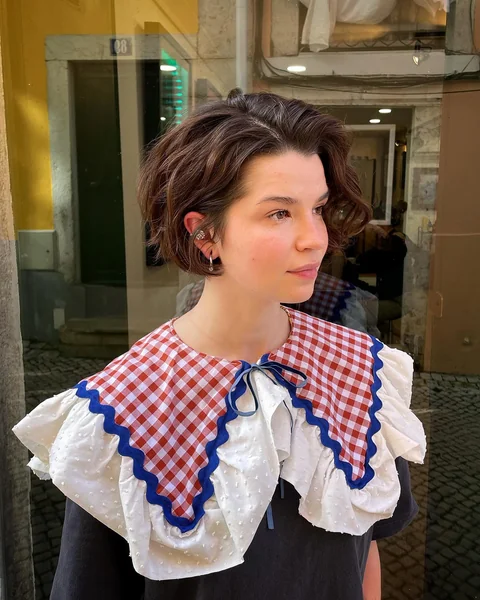 Short Wavy Bob Tucked Behind the Ear