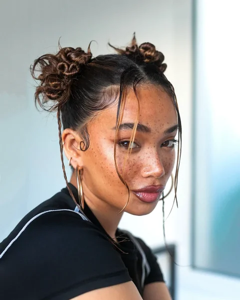 Curly Space Buns with Micro Braids