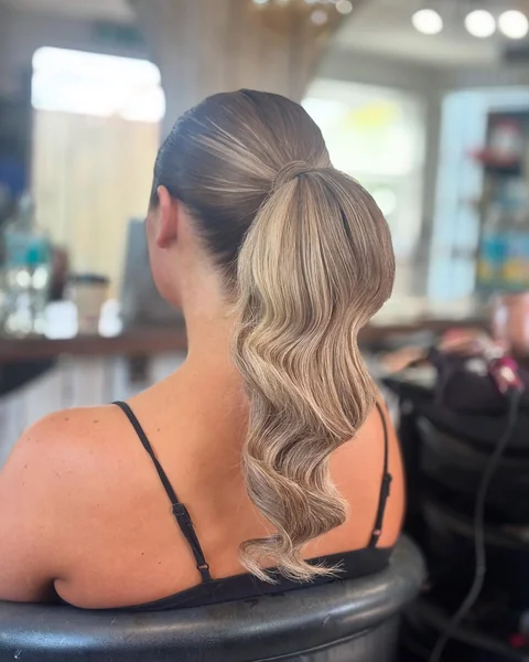 Slick Back Blonde Wave Ponytail