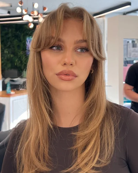 Dark Blonde with Curtain Bangs