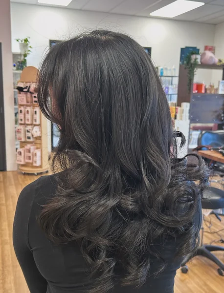 Bouncy Dark Blowout Curls