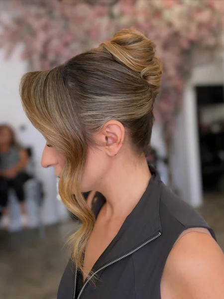 Elegant French Twist with Swooped Fringe