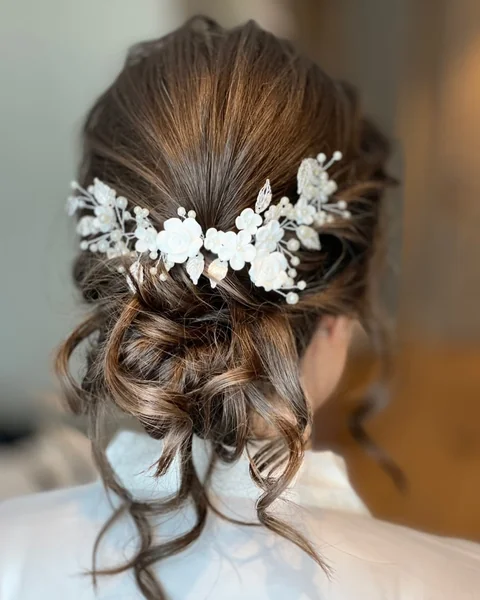 Curled Bun with Floral Vine