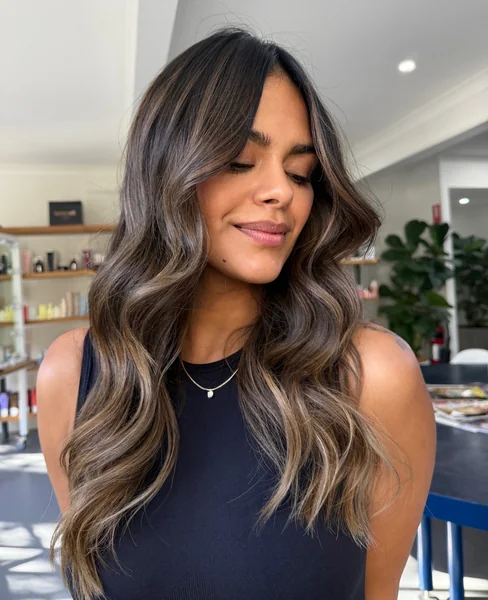 Warm Brunette Waves with Sun-Kissed Highlights
