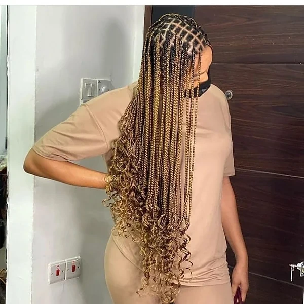 Back View Long Blonde Knotless Braids with Curls