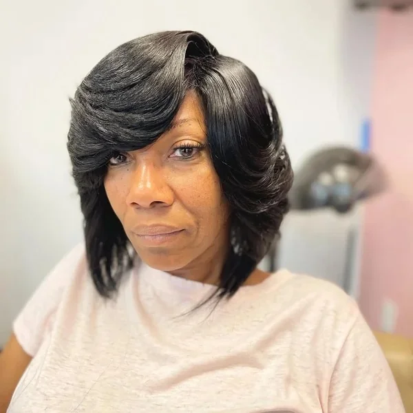 Beautifully Voluminous Black Bob with Feathered Layers
