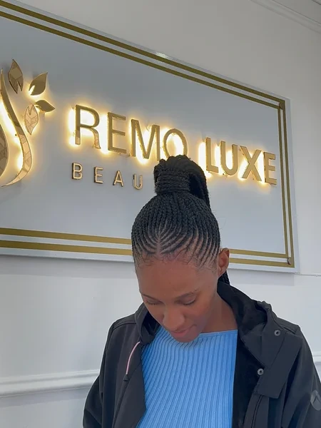Big Cornrow Braids into High Bun