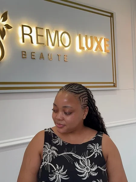 Braided Cornrow Ponytail with Side Sweep