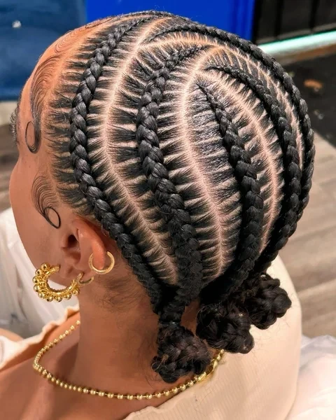 Cornrow Braids with Twisted Bun Accents