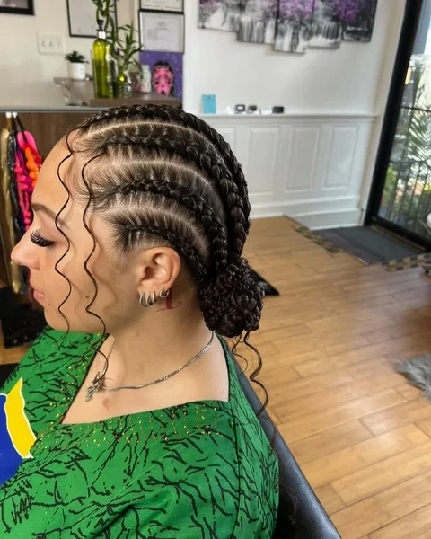 Cornrow Low Bun with Curly Pieces