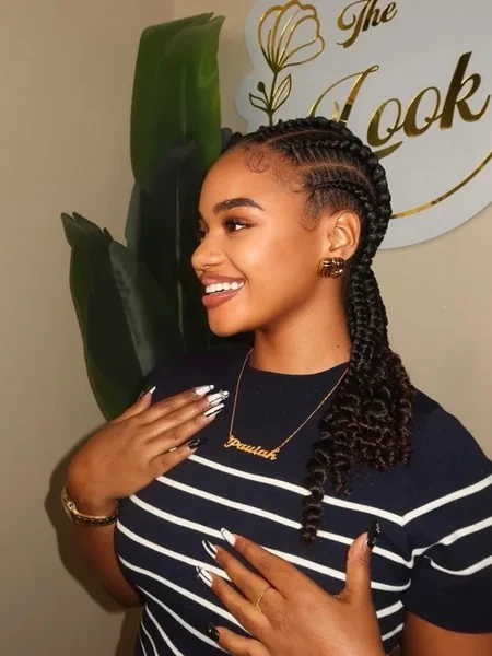 Cornrows with Curly Twist Out Ends