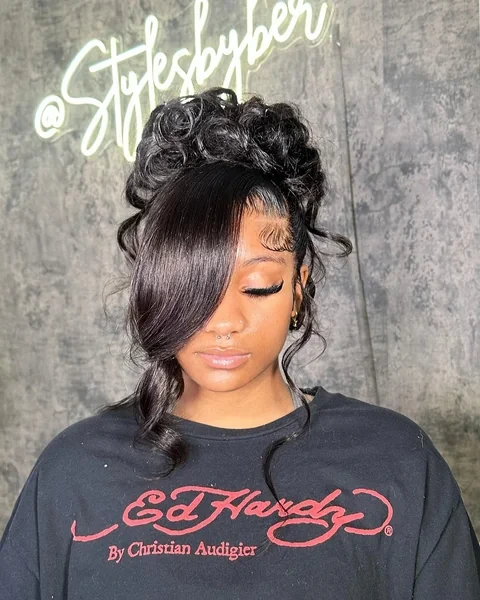 Curly Updo with Side Bang and Wavy Pieces