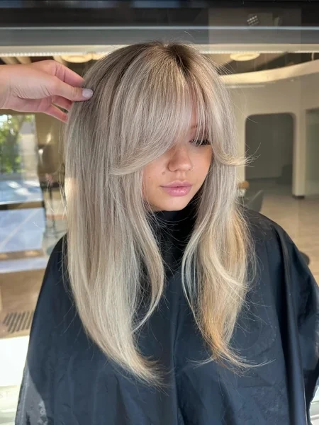 Curtain Bangs with Blonde Balayage