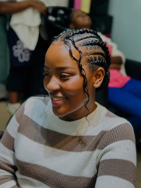 Cute Cornrows with Loose Curl Accents