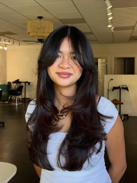 Cute Curtain Bangs on Wavy Black Hair