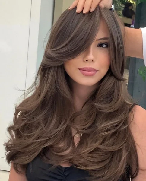 Dramatic Long Side Swept Fringe