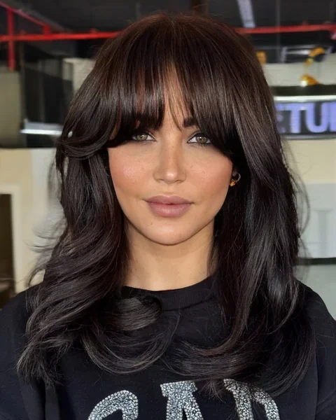 Dramatic Side Swept Bangs for Round Face