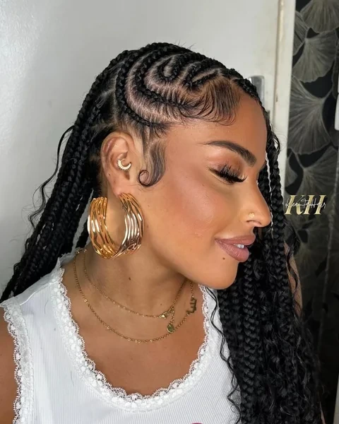 Fulani Braids with Curly Ends and Gold Accessories