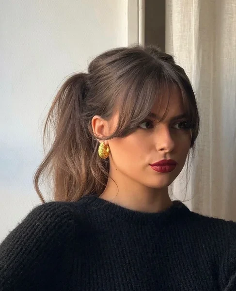 Half Up Ponytail with Curtain Bangs