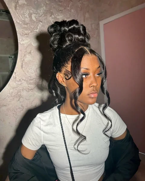 High Bun Updo with Face Framing Curls