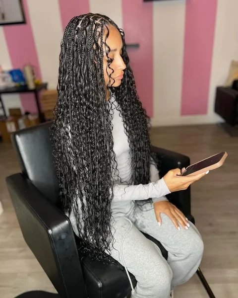 Long Black Boho Knotless Braids with Voluminous Curls