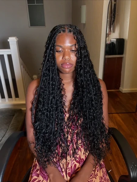 Long Black Knotless Twist Braids with Curls