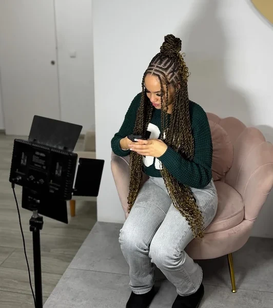 Long Brown Twists Half Up Bun with Caramel Highlights