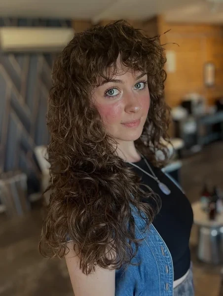Long Curly Shag Haircut with Bangs