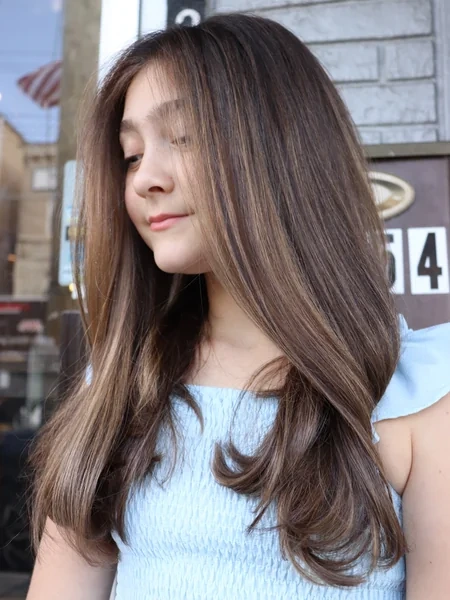 Long Layered Haircut with Flipped Ends