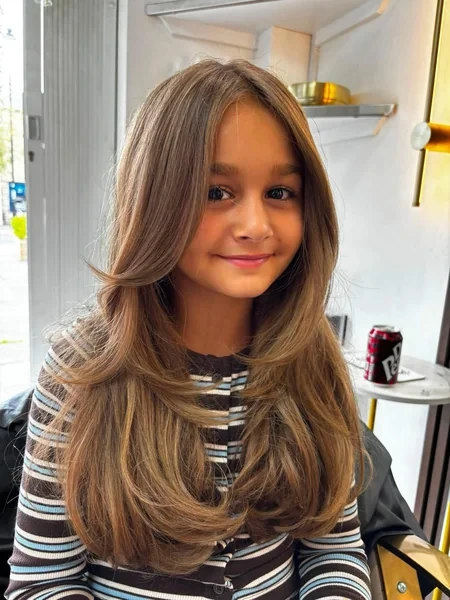 Long Layered Haircut with Soft Bangs