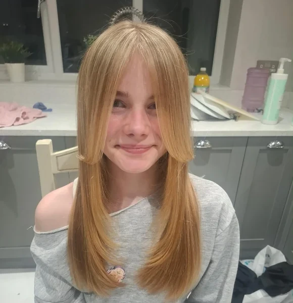 Long Layers with Curtain Bangs