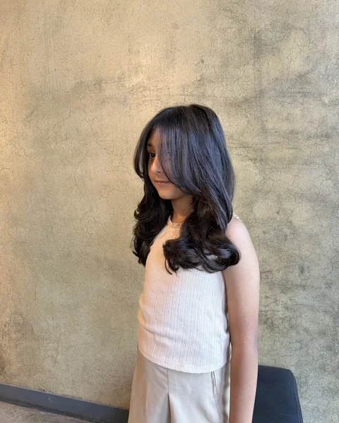 Long Layers with Side Swept Bangs
