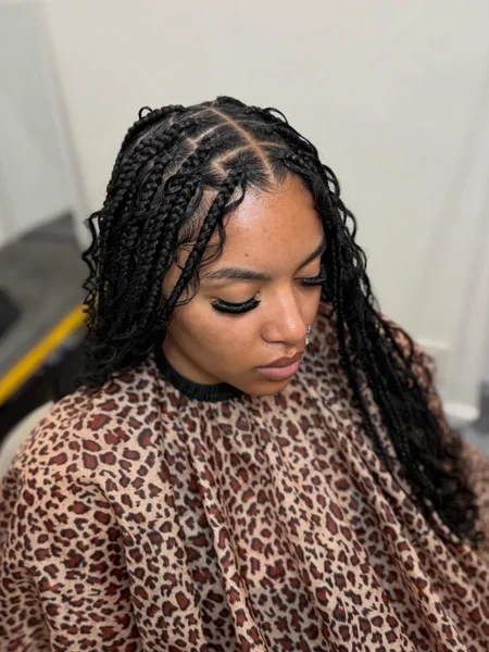 Medium Black Knotless Braids with Curly Leave Out
