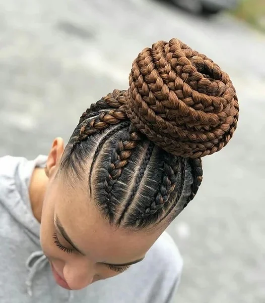 Sculpted Copper Braided High Bun with Intricate Feed In Design
