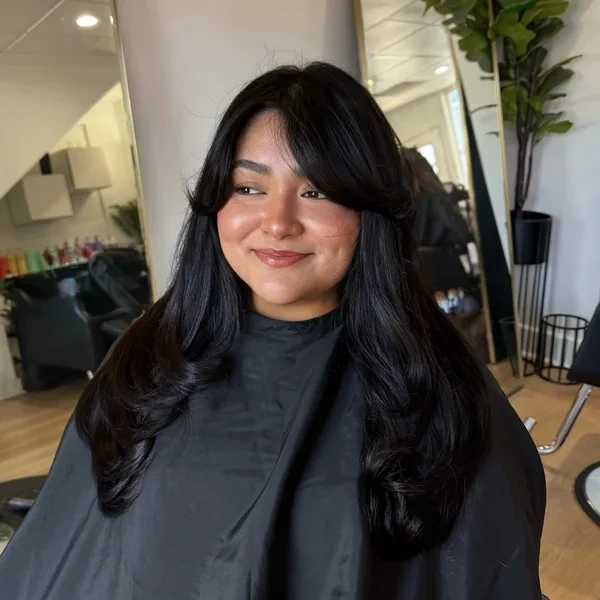 Soft Curtain Bangs on Wavy Black Hair