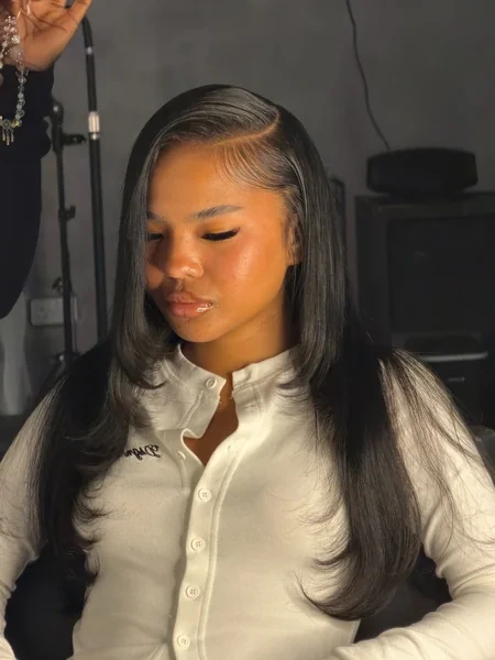 Softly Layered Side Part Sew In