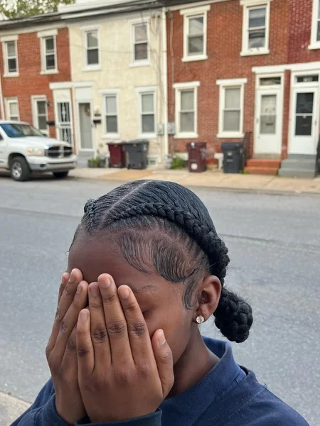 Two Braids into a Low Bun for a Neat Finish