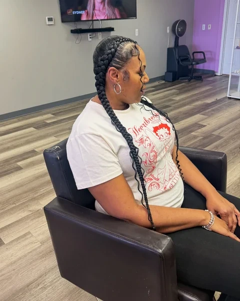 Two Braids with Curly Tips and a Sleek Top