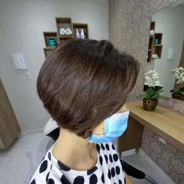 Voluminous Blonde Bob with 90s Face Framing Layers