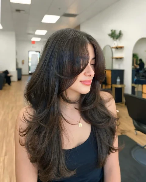 Wavy Curtain Bangs on Dark Hair